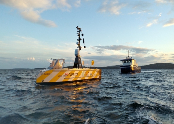 The GEBCO-NF Alumni team concept sets sail from Horten, Norway, on the first of three 24-hour sea-trials. The team observed the successful round of tests from a guard vessel, seen here behind USV-Maxlimer